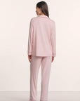 Model is wearing Gisele TENCEL™ Modal Long PJ Set in Pale Pink/Fig