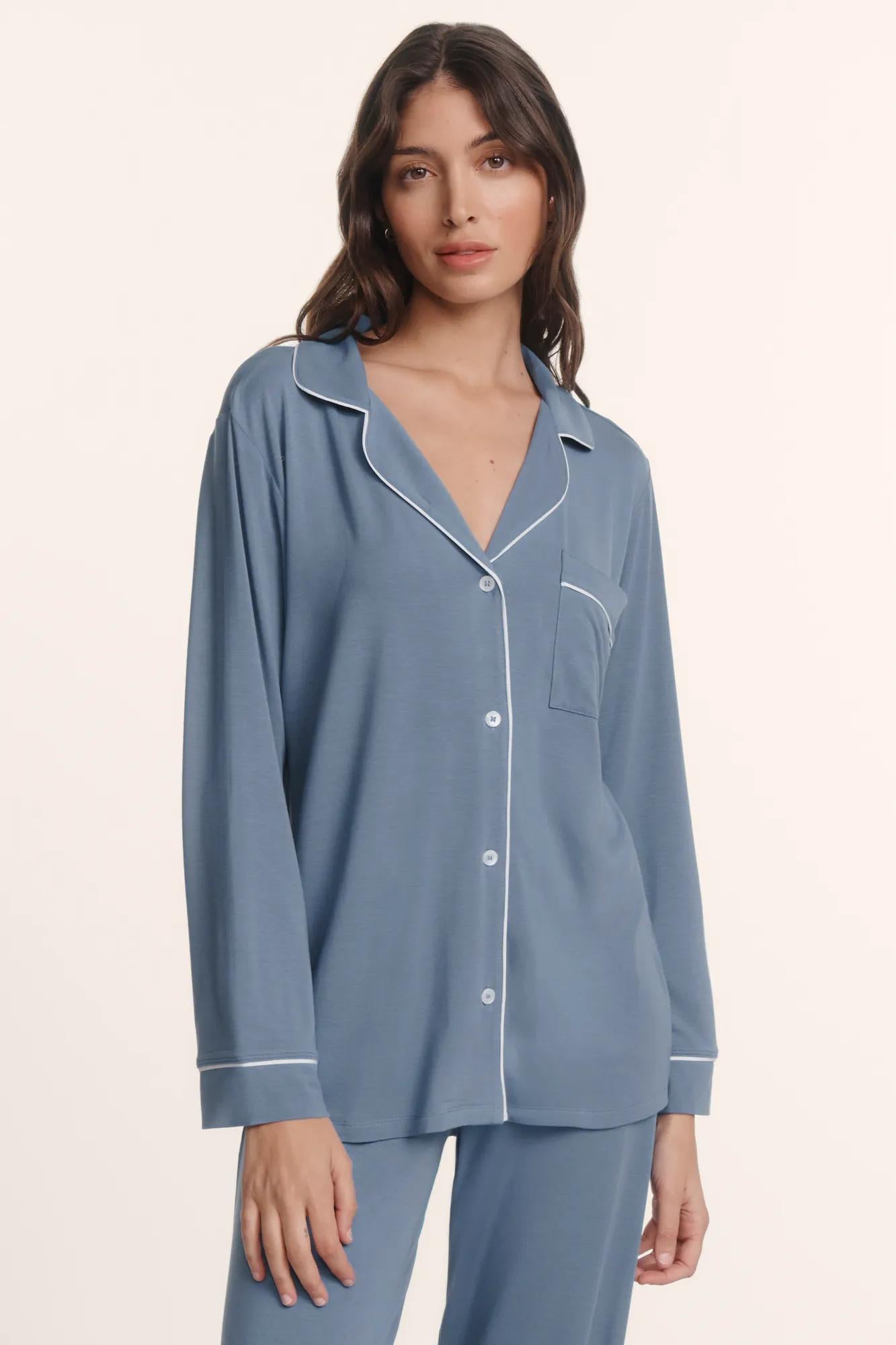 Model is wearing Gisele TENCEL™ Modal Long PJ Set in Slate Blue/Ivory