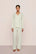 Model is wearing Gisele TENCEL™ Modal Long PJ Set  in Seafoam/Ivory