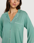 Model is wearing Gisele TENCEL™ Modal Long PJ Set in Seagrass/White