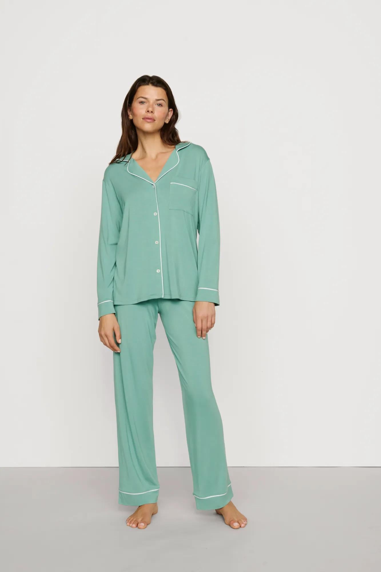 Model is wearing Gisele TENCEL™ Modal Long PJ Set in Seagrass/White
