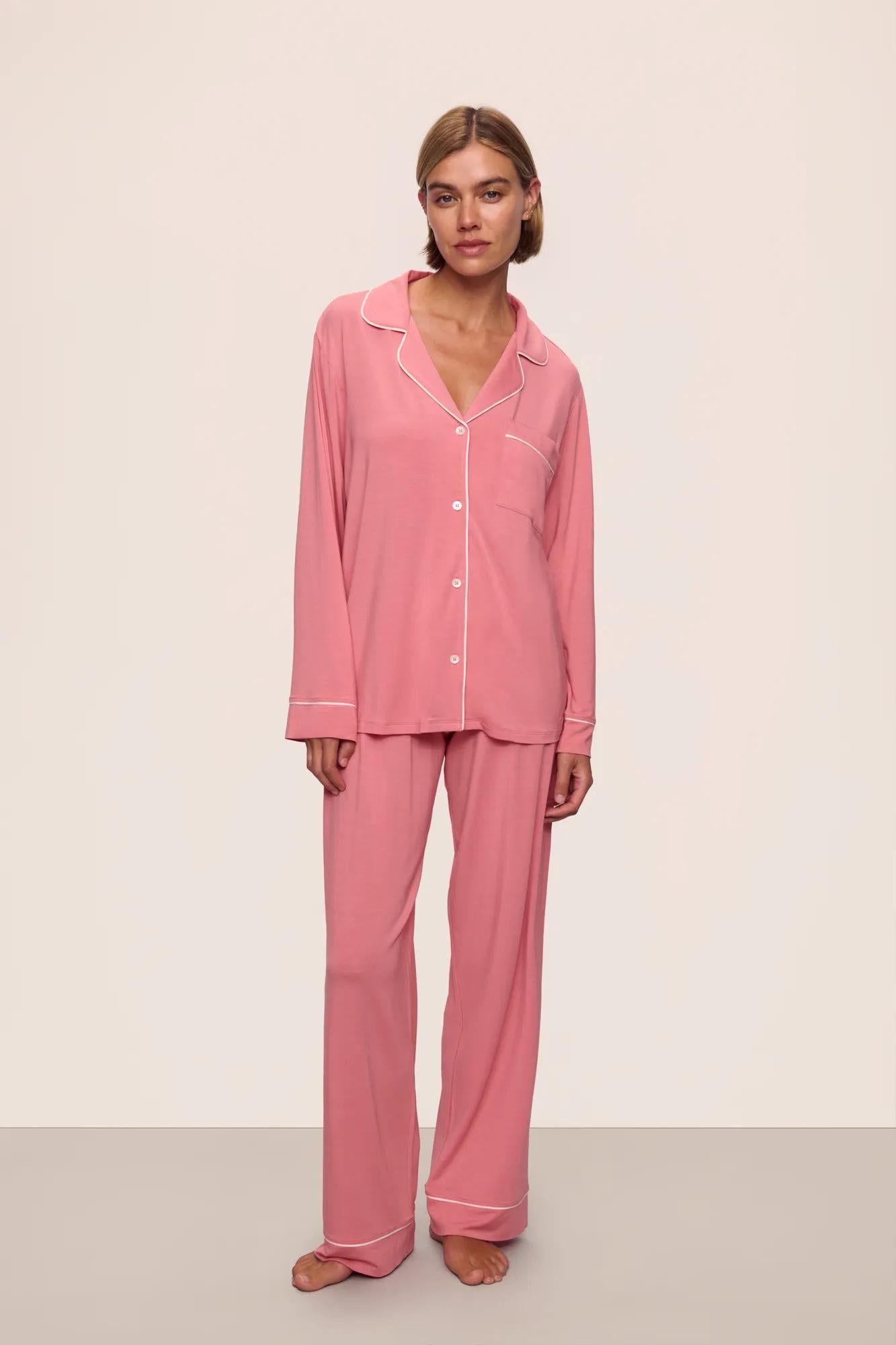 Model is wearing Gisele TENCEL™ Modal Long PJ Set in  Sunkissed Coral/Ivory