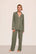 Model is wearing Gisele TENCEL™ Modal Long PJ Set  in Smokey Olive/Ivory