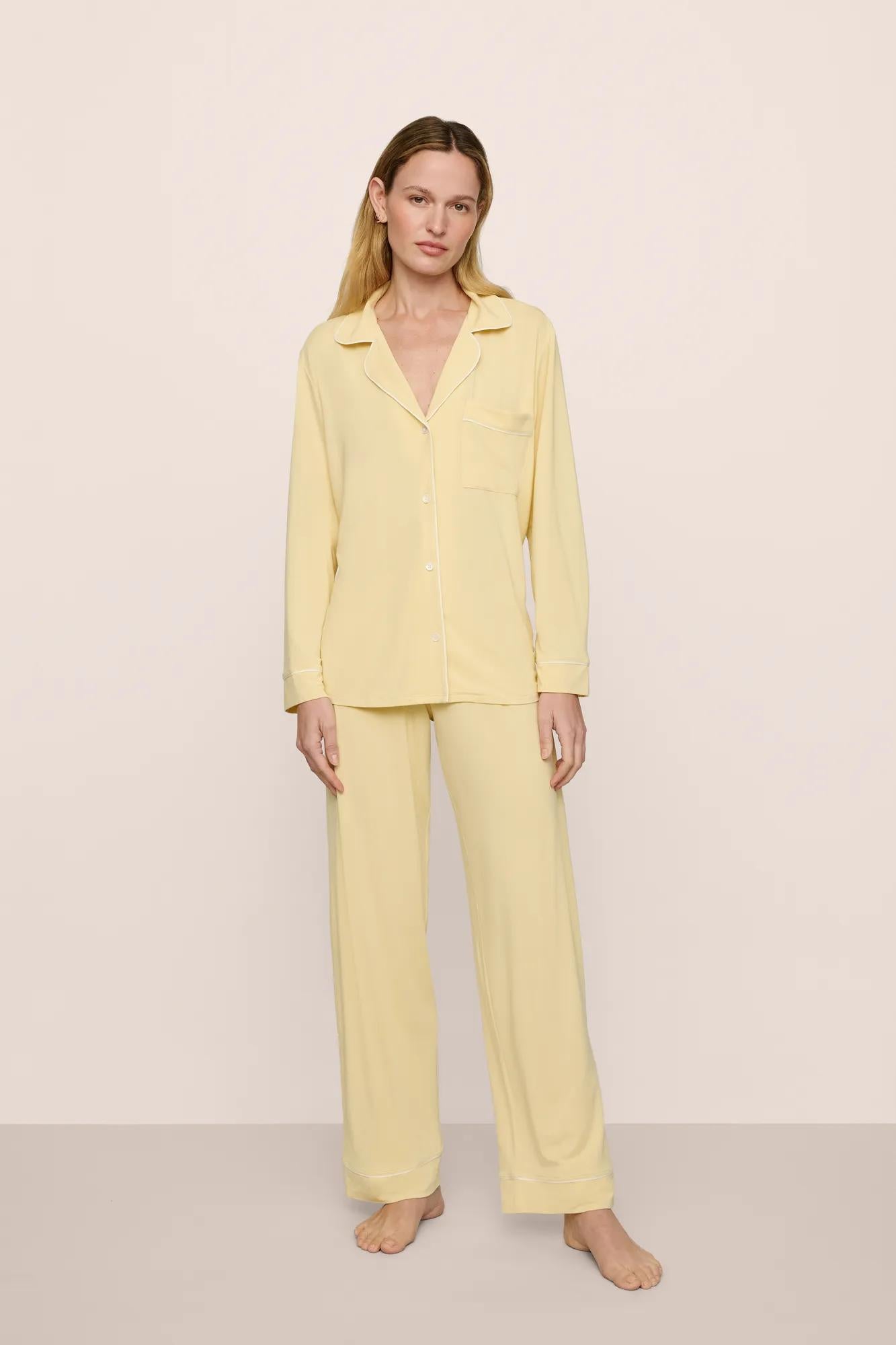 Model is wearing Gisele TENCEL™ Modal Long PJ Set in  Sunrise/Ivory