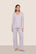 Model is wearing Gisele TENCEL™ Modal Long PJ Set  in Thistle/Ivory