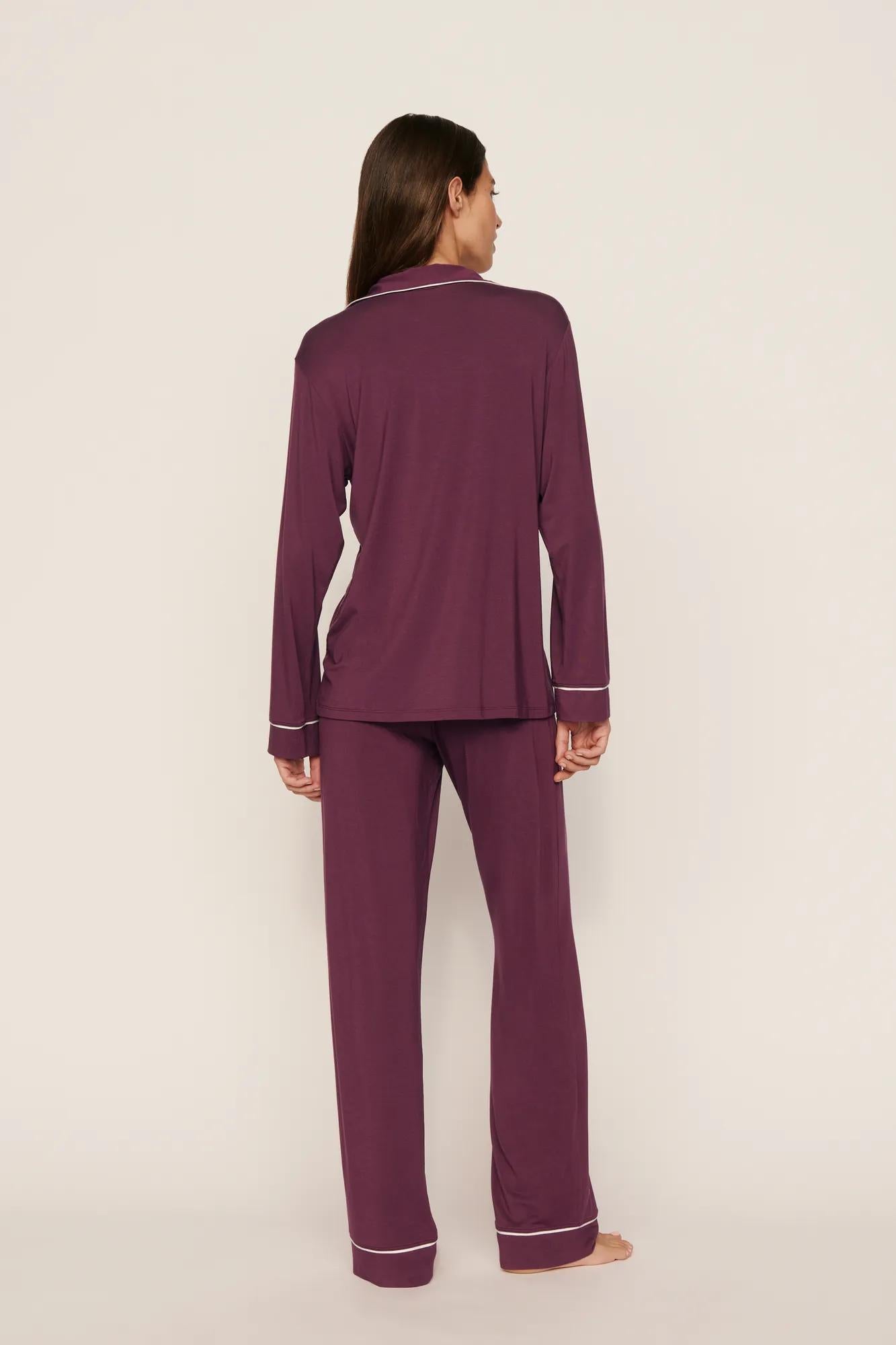 Model is wearing Gisele TENCEL™ Modal Long PJ Set in Wildberry/Ivory