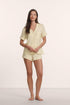 Model is wearing Gisele TENCEL™ Modal Relaxed Short PJ Set in Buttercream/Ivory