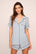 Model is wearing Gisele TENCEL™ Modal Relaxed Short PJ Set  in  Gray Dawn/Navy
