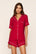 Model is wearing Gisele TENCEL™ Modal Relaxed Short PJ Set in Holly Red/Ivory