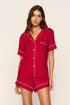 Model is wearing Gisele TENCEL™ Modal Relaxed Short PJ Set in Holly Red/Ivory