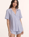 Model is wearing Gisele TENCEL™ Modal Relaxed Short PJ Set in Lavender Dusk/Ivory