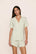 Model is wearing Gisele TENCEL™ Modal Relaxed Short PJ Set  in Seafoam/Ivory