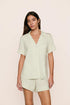Model is wearing Gisele TENCEL™ Modal Relaxed Short PJ Set  in Seafoam/Ivory