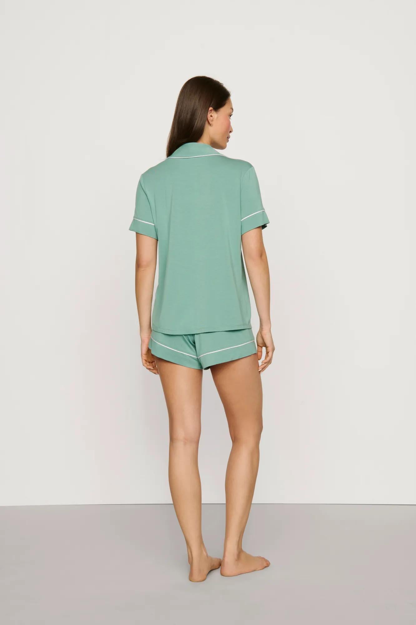 Model is wearing Gisele TENCEL™ Modal Relaxed Short PJ Set in Seagrass/White