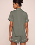 Model is wearing Gisele TENCEL™ Modal Relaxed Short PJ Set  in Smokey Olive/Ivory