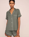 Model is wearing Gisele TENCEL™ Modal Relaxed Short PJ Set  in Smokey Olive/Ivory