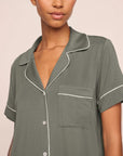 Model is wearing Gisele TENCEL™ Modal Relaxed Short PJ Set  in Smokey Olive/Ivory