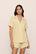 Model is wearing Gisele TENCEL™ Modal Relaxed Short PJ Set in  Sunrise/Ivory