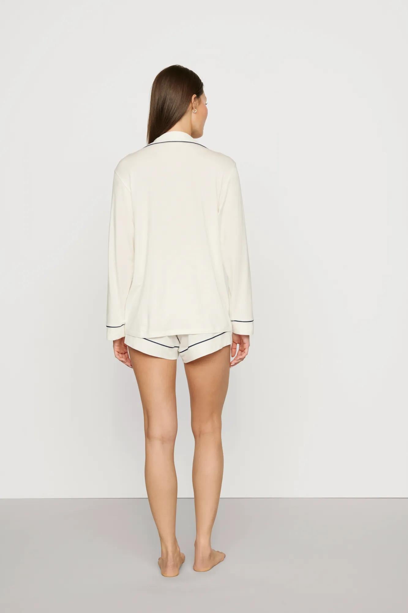 Model is wearing Gisele TENCEL™ Modal Long Sleeve Short PJ Set in Ivory/Navy