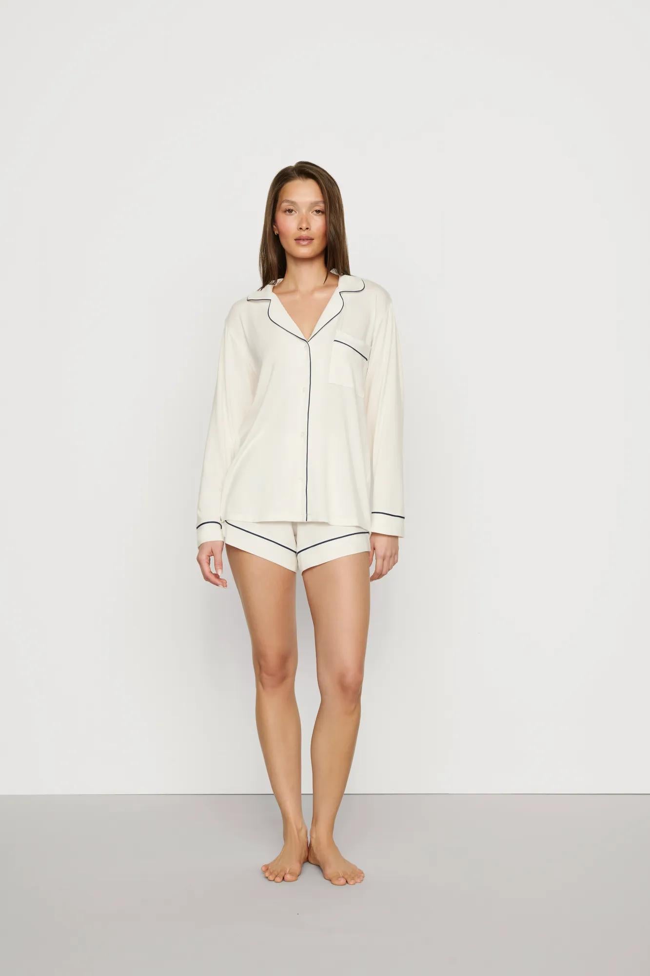 Model is wearing Gisele TENCEL™ Modal Long Sleeve Short PJ Set in Ivory/Navy