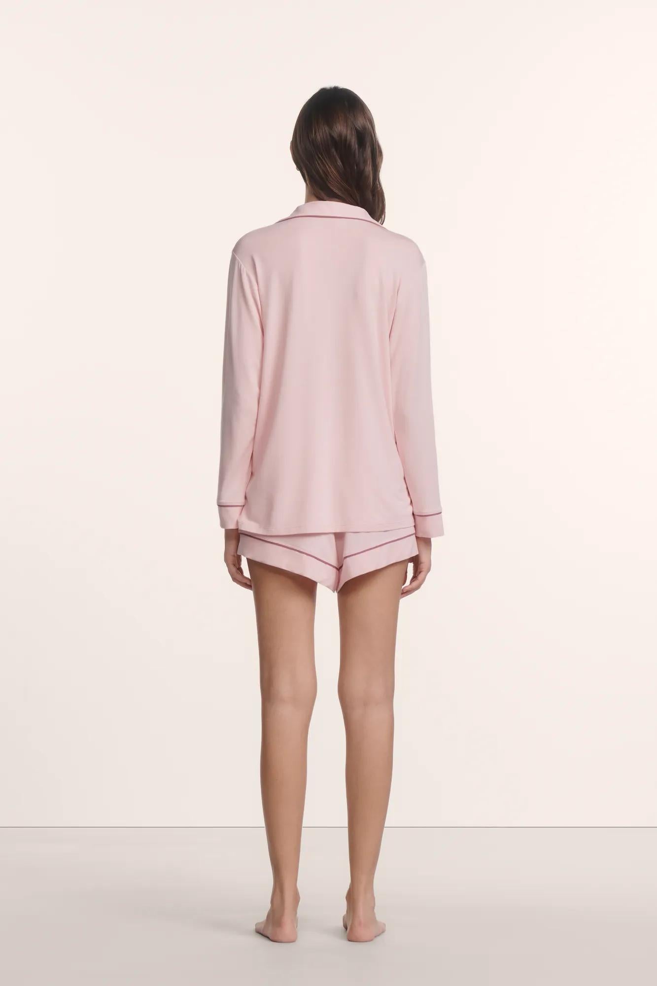 Model is wearing Gisele TENCEL™ Modal Long Sleeve Short PJ Set in Pale Pink/Fig