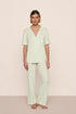 Model is wearing Gisele TENCEL™ Modal Short Sleeve & Pant PJ Set  in Seafoam/Ivory