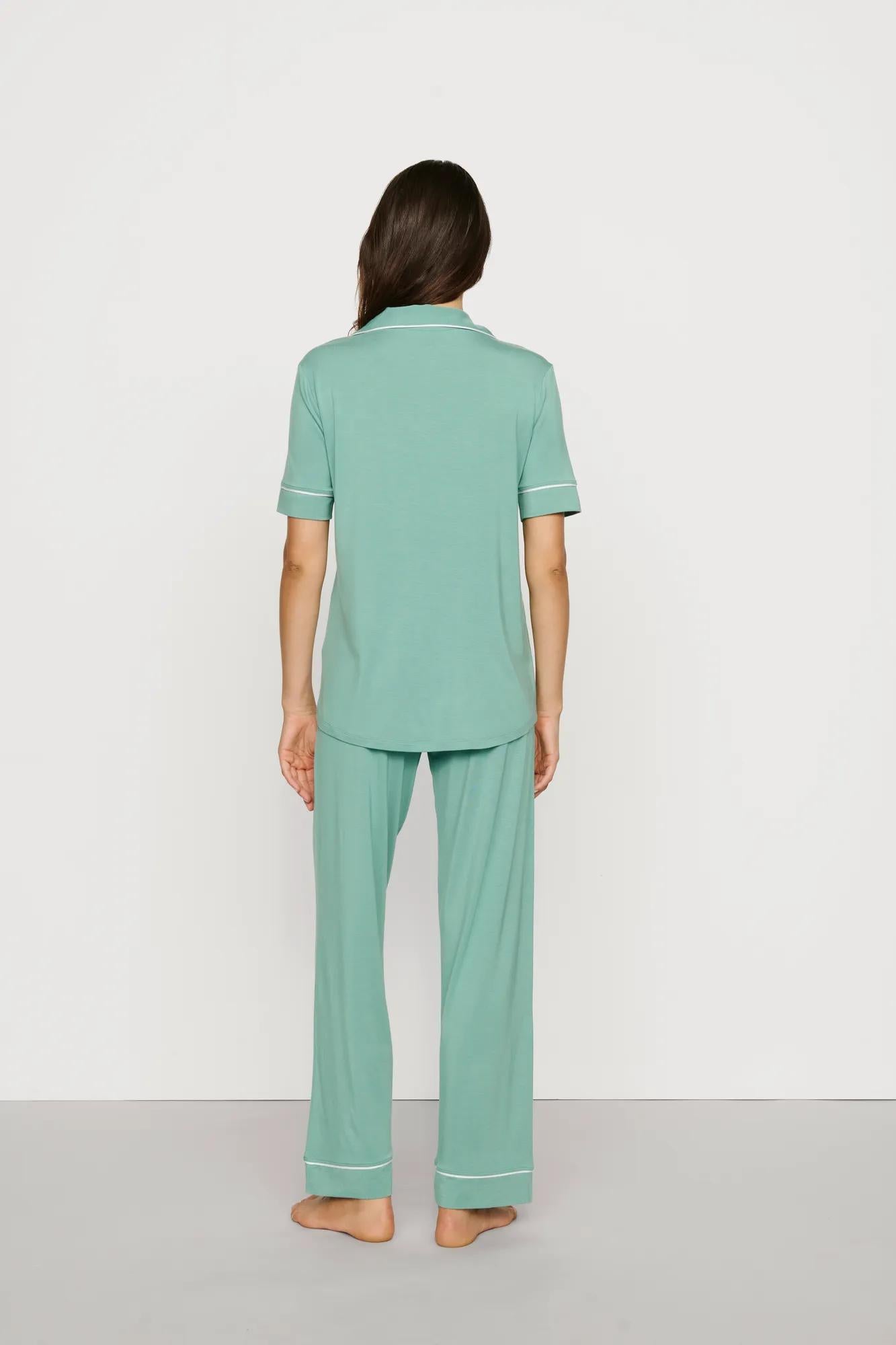 Model is wearing Gisele TENCEL™ Modal Short Sleeve & Pant PJ Set in Seagrass/White