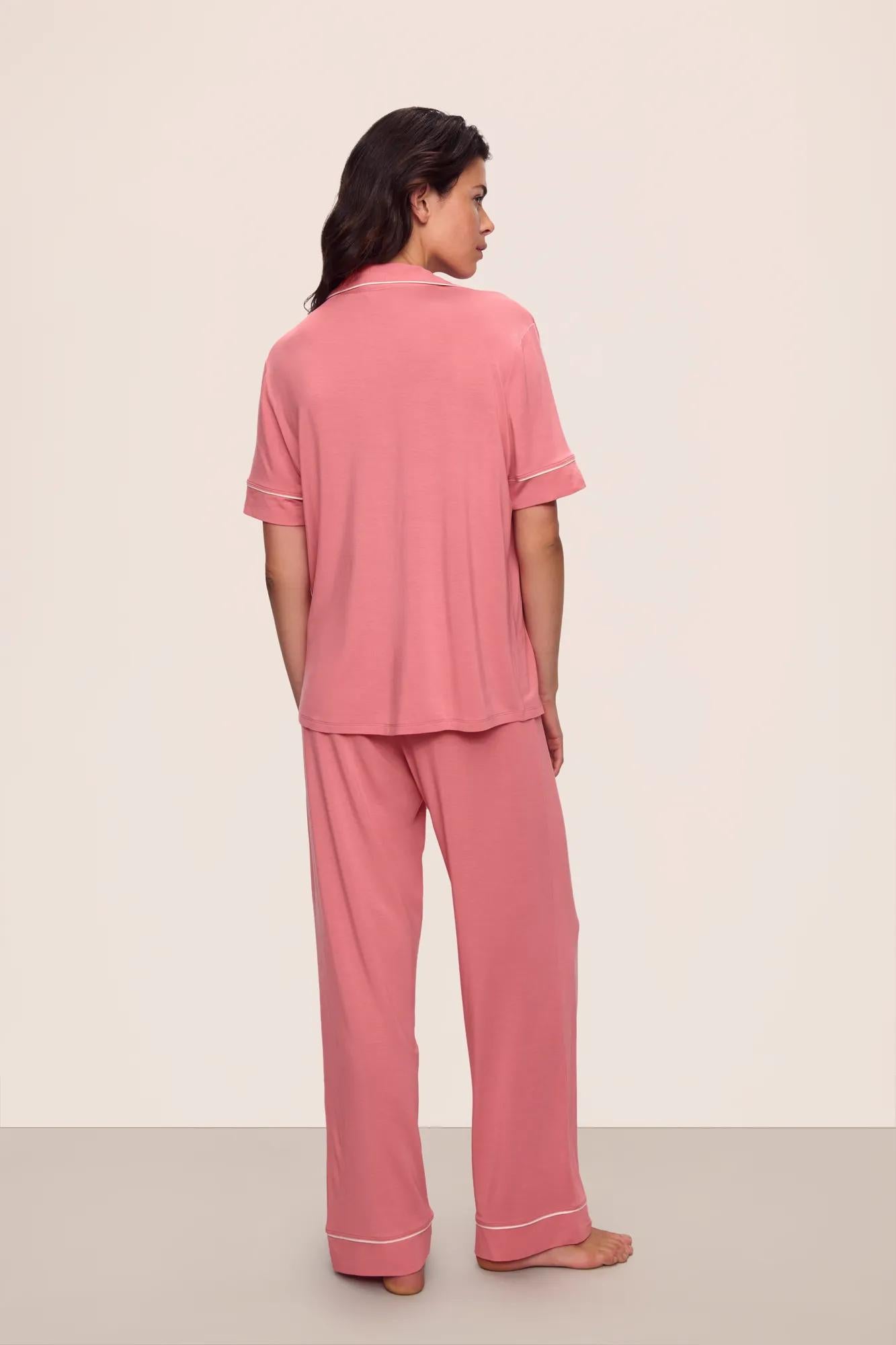 Model is wearing Gisele TENCEL™ Modal Short Sleeve & Pant PJ Set in  Sunkissed Coral/Ivory