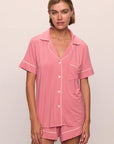 Model is wearing Gisele TENCEL™ Modal Relaxed Short PJ Set in  Sunkissed Coral/Ivory