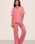 Model is wearing Gisele TENCEL™ Modal Short Sleeve & Pant PJ Set in  Sunkissed Coral/Ivory