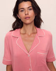 Model is wearing Gisele TENCEL™ Modal Short Sleeve & Pant PJ Set in  Sunkissed Coral/Ivory