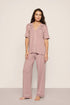 Model is wearing Gisele TENCEL™ Modal Short Sleeve & Pant PJ Set in Woodrose/Ivory