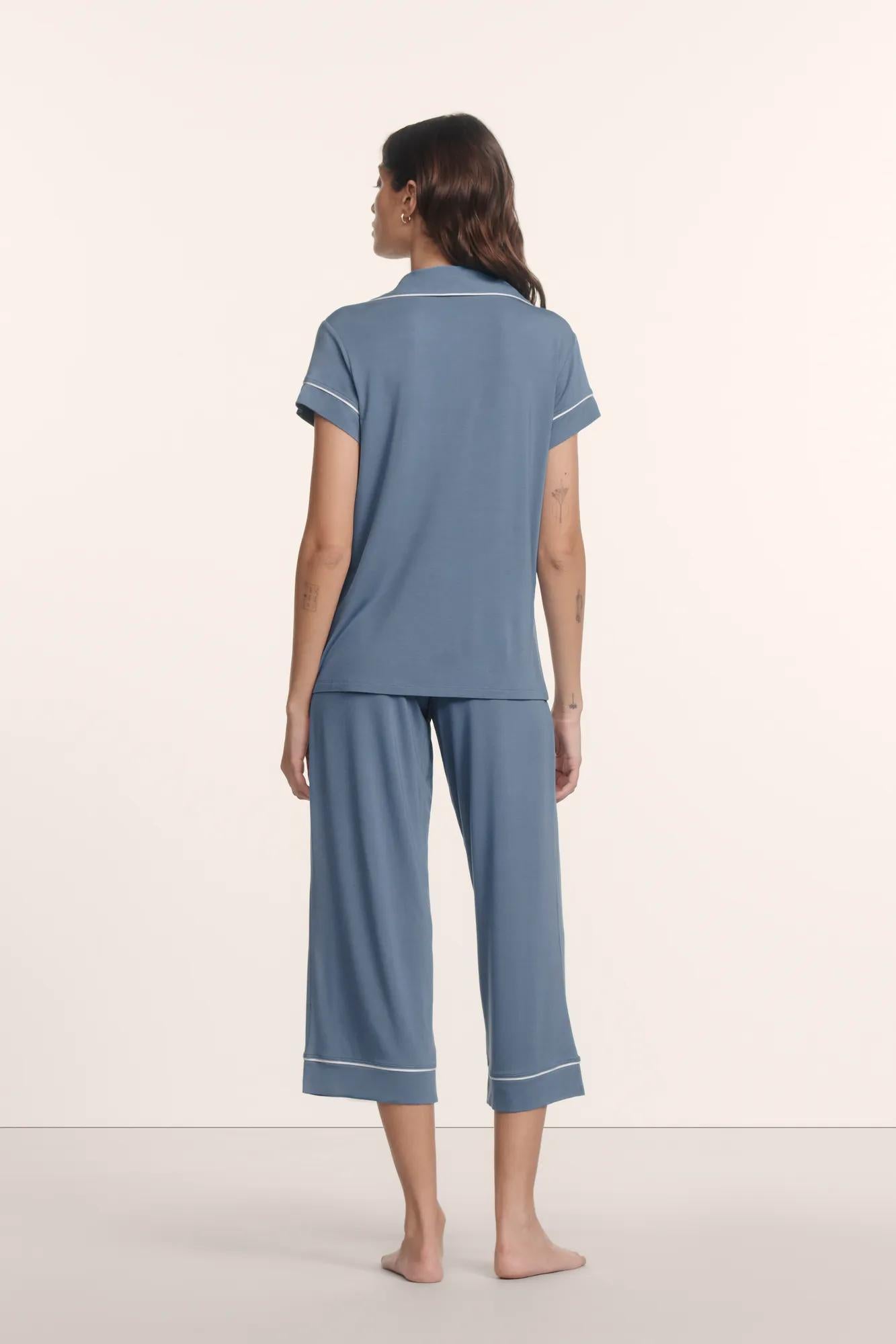 Model is wearing Gisele TENCEL™ Modal Short Sleeve Cropped PJ Set in Slate Blue/Ivory
