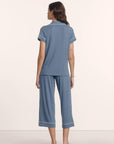Model is wearing Gisele TENCEL™ Modal Short Sleeve Cropped PJ Set in Slate Blue/Ivory