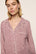 Model is wearing Gisele Printed TENCEL™ Modal Long PJ Set in Animal Instinct Woodrose/Ivory