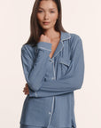 Model is wearing Gisele Printed TENCEL™ Modal Long PJ Set in Duo Stripe Slate Blue/Ivory