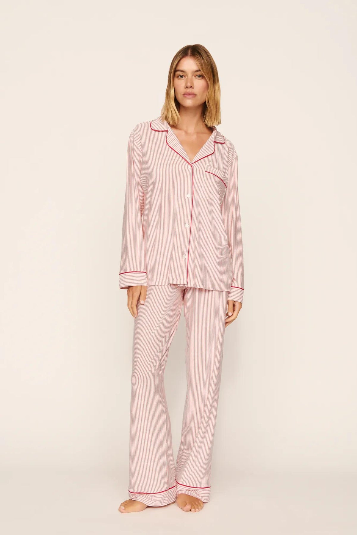 Model is wearing Gisele Printed TENCEL™ Modal Long PJ Set in Duo Stripe Hollyred/Hollyred