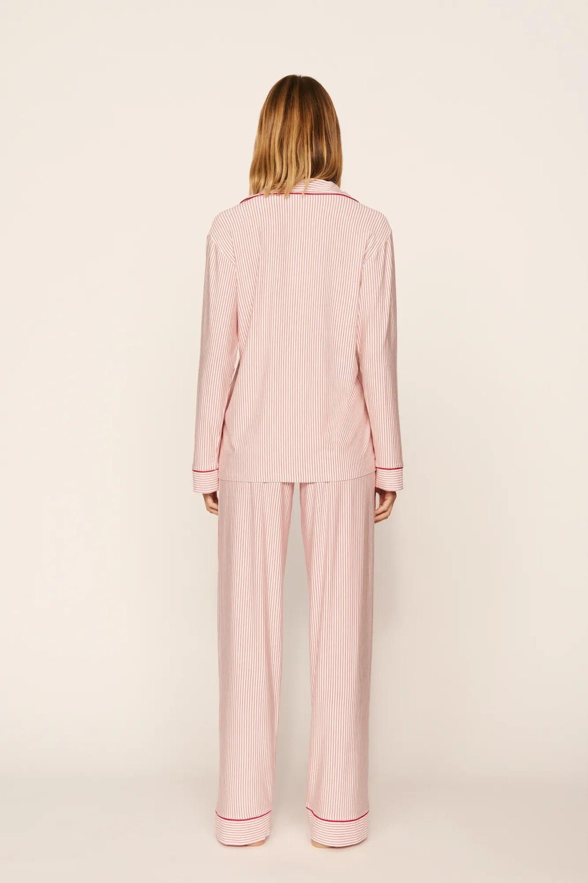 Model is wearing Gisele Printed TENCEL™ Modal Long PJ Set in Duo Stripe Hollyred/Hollyred