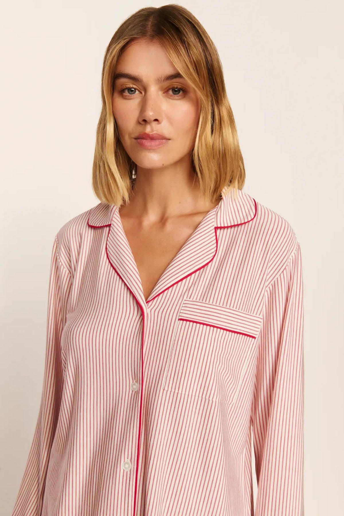Model is wearing Gisele Printed TENCEL™ Modal Long PJ Set in Duo Stripe Hollyred/Hollyred