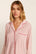 Model is wearing Gisele Printed TENCEL™ Modal Long PJ Set in Duo Stripe Hollyred/Hollyred