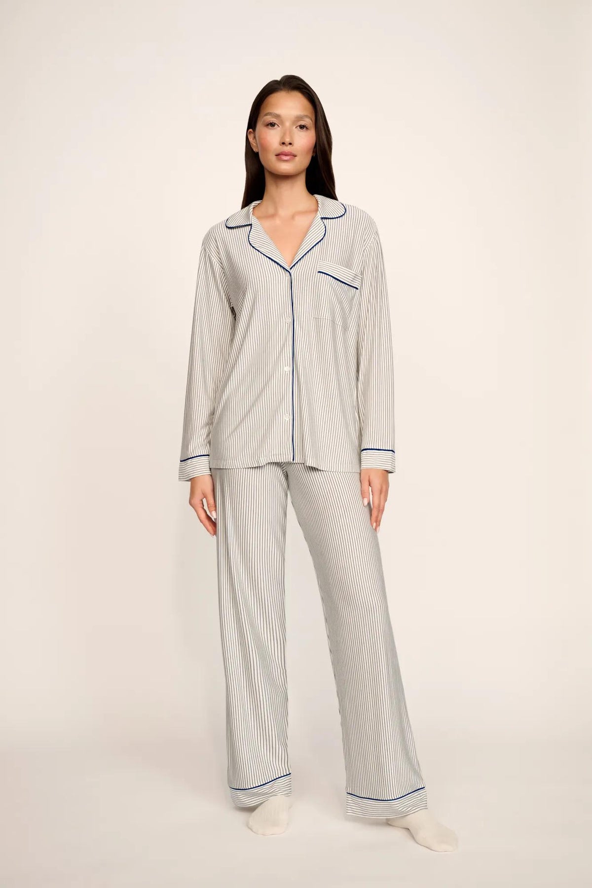 Model is wearing Gisele Printed TENCEL™ Modal Long PJ Set in Duo Stripe Ivory/Navy