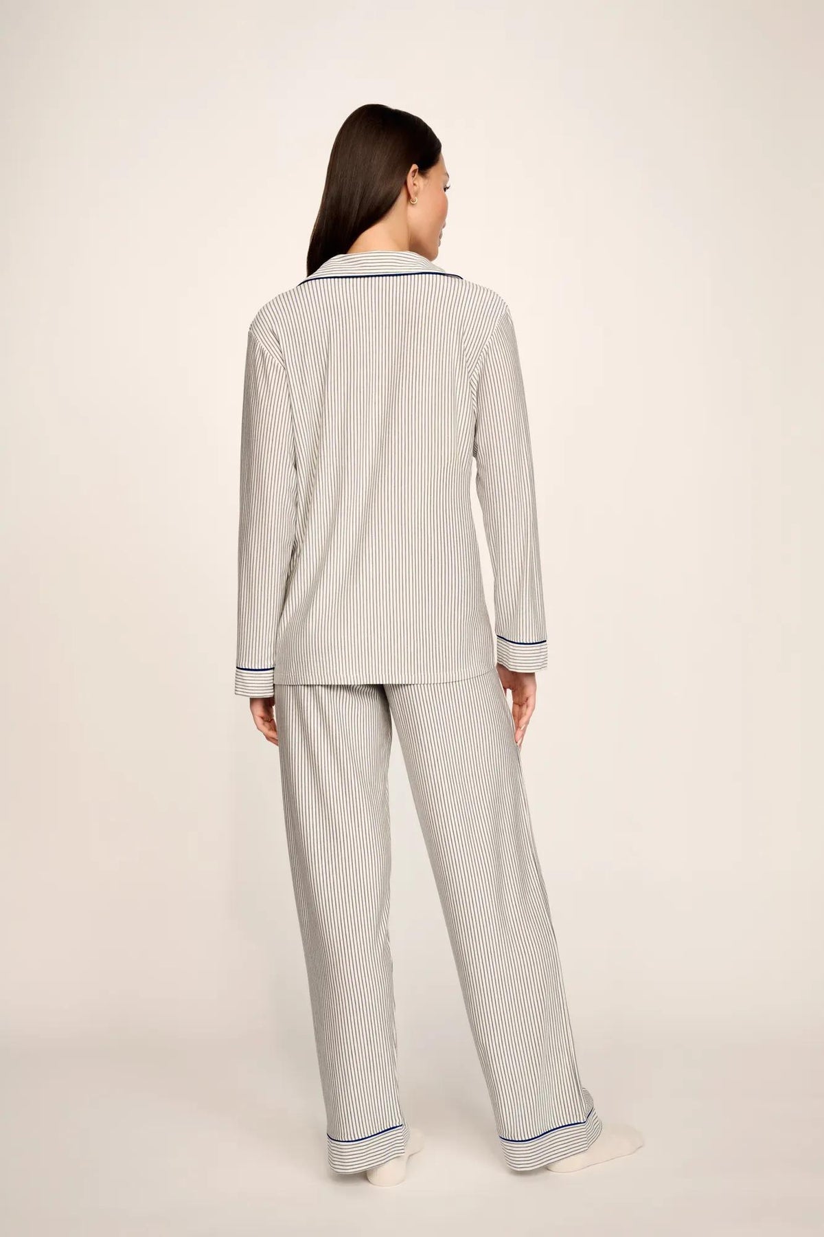 Model is wearing Gisele Printed TENCEL™ Modal Long PJ Set in Duo Stripe Ivory/Navy