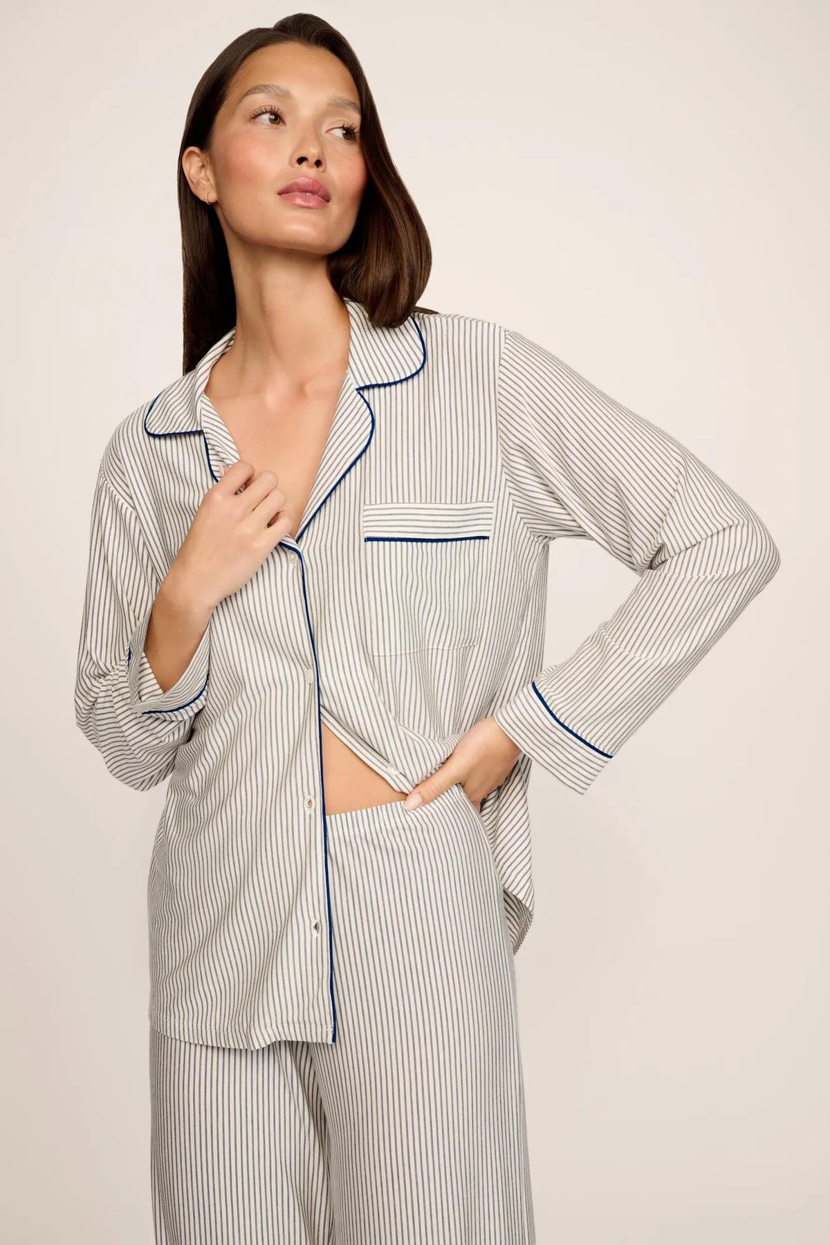 Model is wearing Gisele Printed TENCEL™ Modal Long PJ Set in Duo Stripe Ivory/Navy