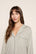Model is wearing Gisele Printed TENCEL™ Modal Long PJ Set  in  Geo Mod Desert Sage/Desert Sag