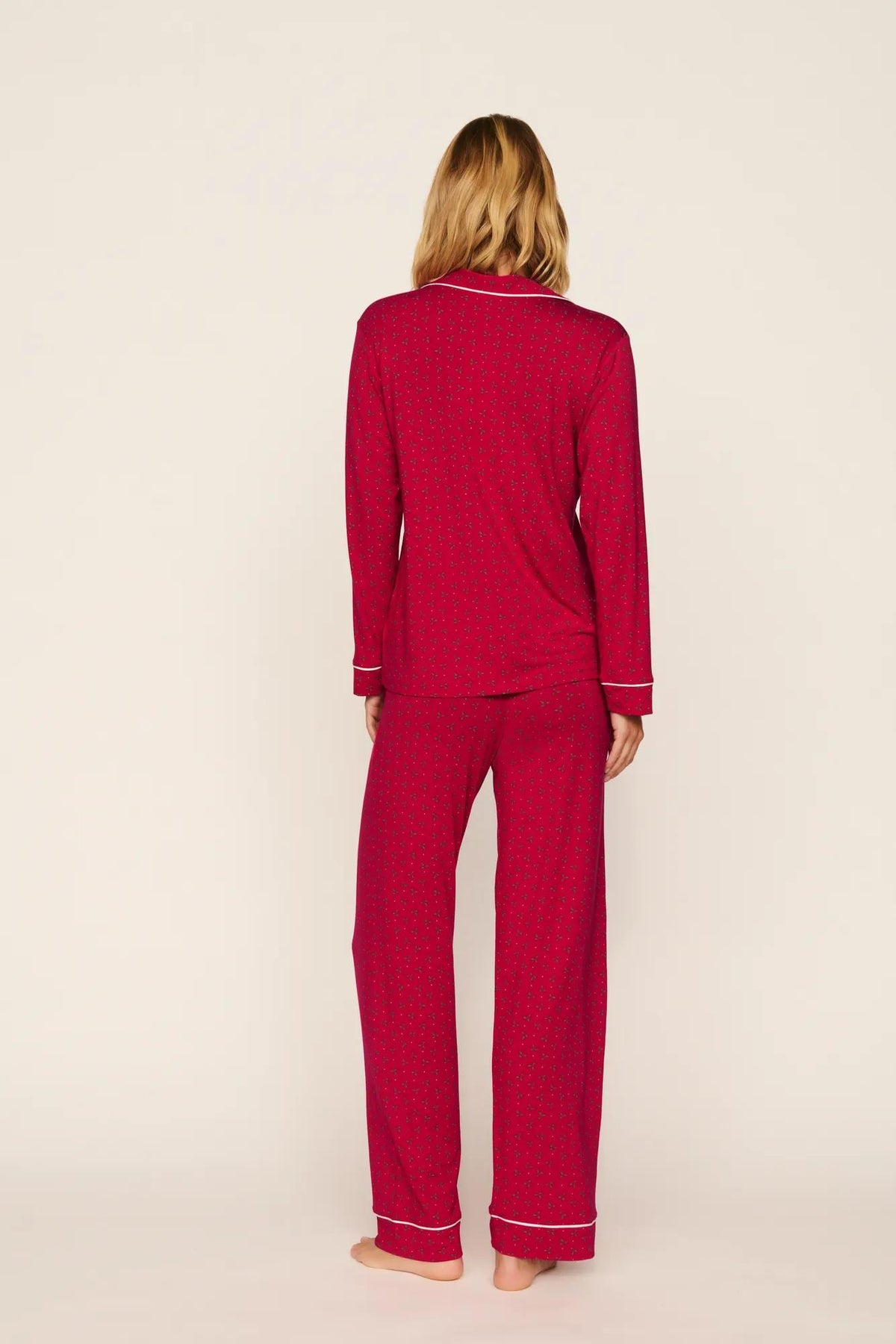 Model is wearing Gisele Printed TENCEL™ Modal Long PJ Set in Hollyberry Holly Red/Ivory