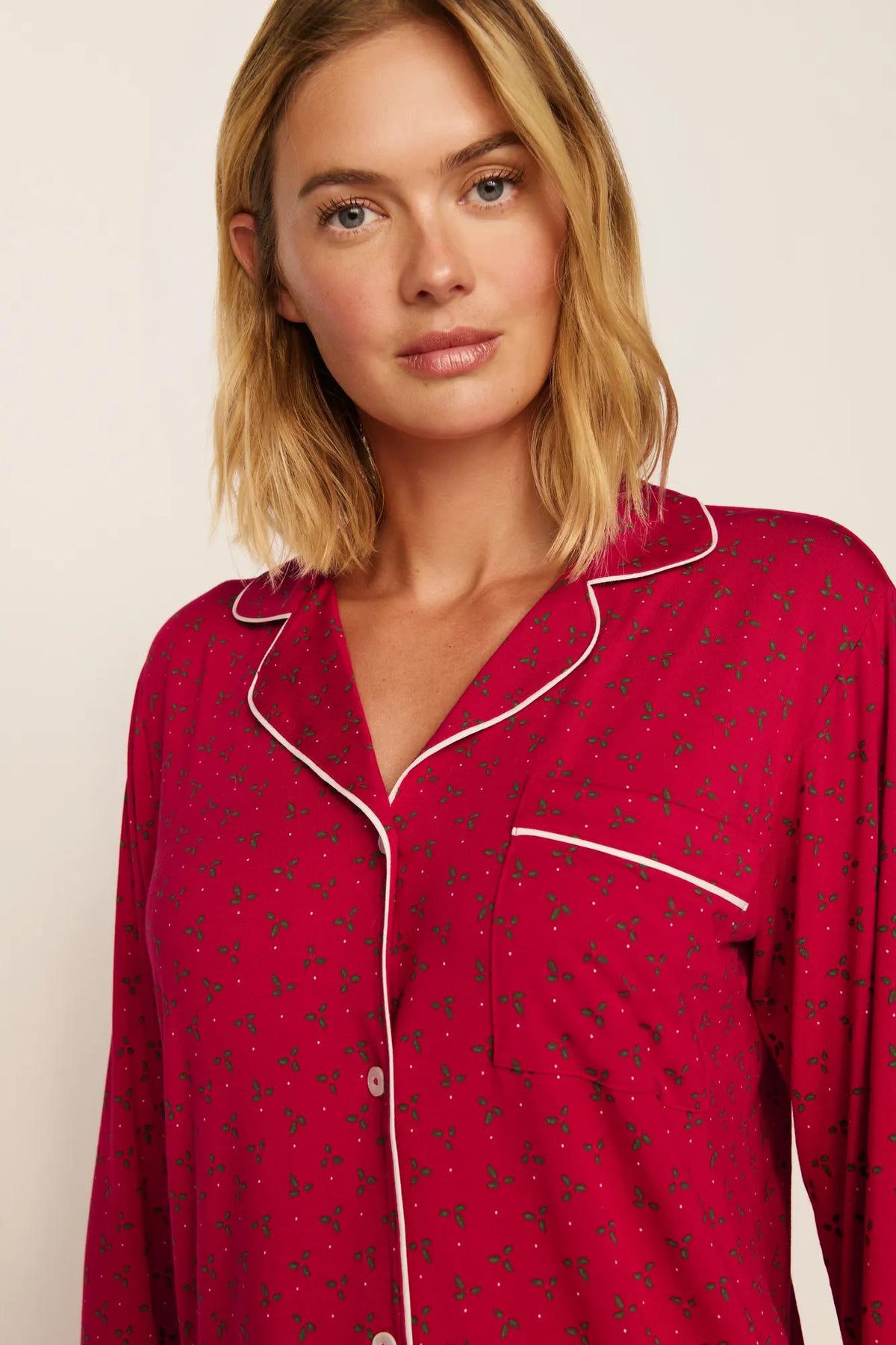 Model is wearing Gisele Printed TENCEL™ Modal Long PJ Set in Hollyberry Holly Red/Ivory