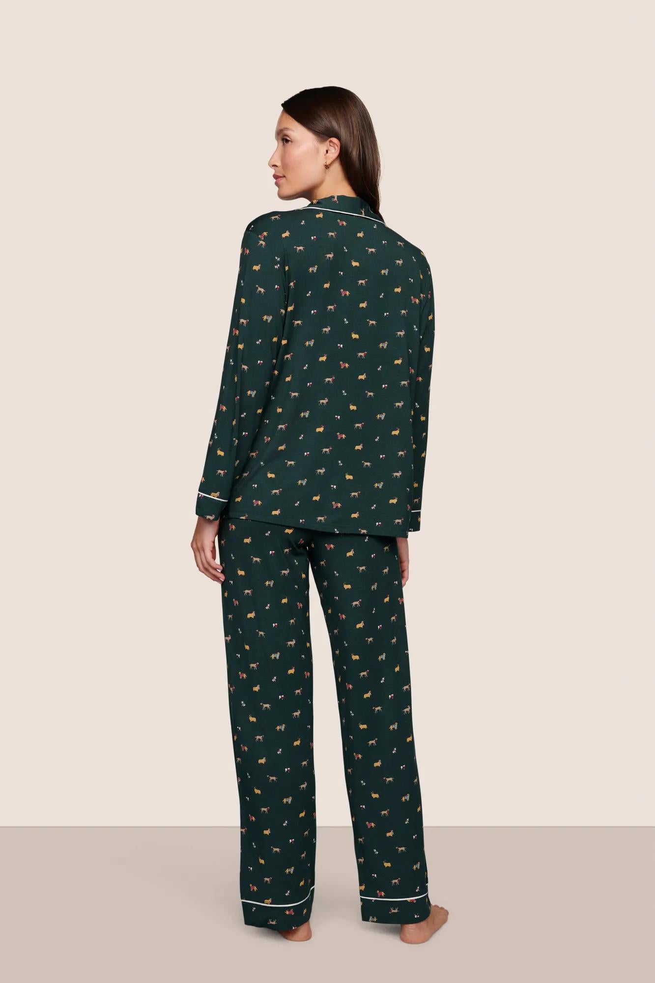 Model is wearing Gisele Printed TENCEL™ Modal Long PJ Set  in Holiday Dogs Pine/Ivory