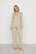 Model is wearing Gisele Printed TENCEL™ Modal Long PJ Set in Hourglass Sunbeam/Navy