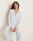 Model is wearing Gisele Printed TENCEL™ Modal Long PJ Set in Large Swans Ice Blue/Ivory