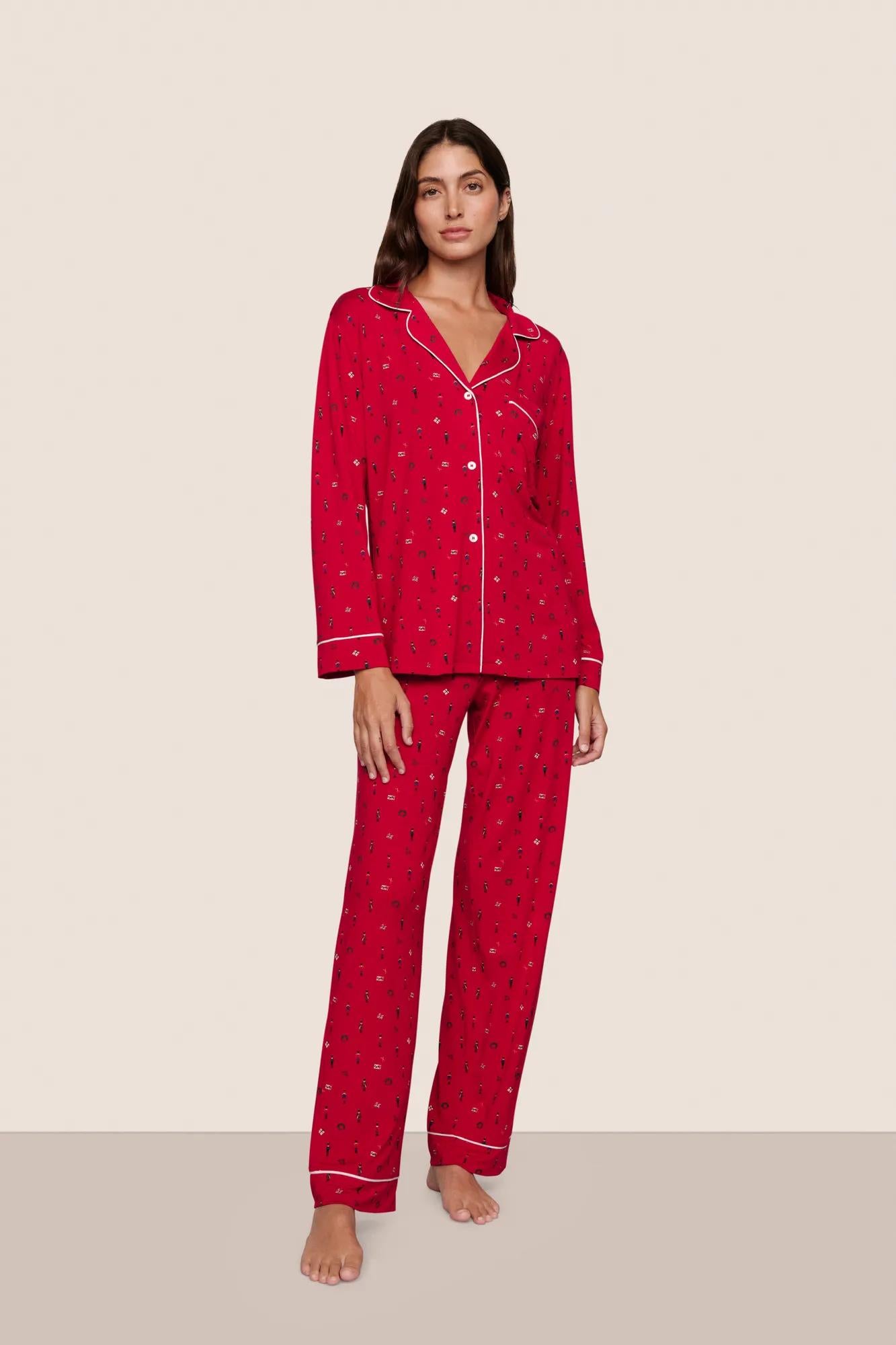 Model is wearing Gisele Printed TENCEL™ Modal Long PJ Set  in Nutcracker Holly Red/Ivory